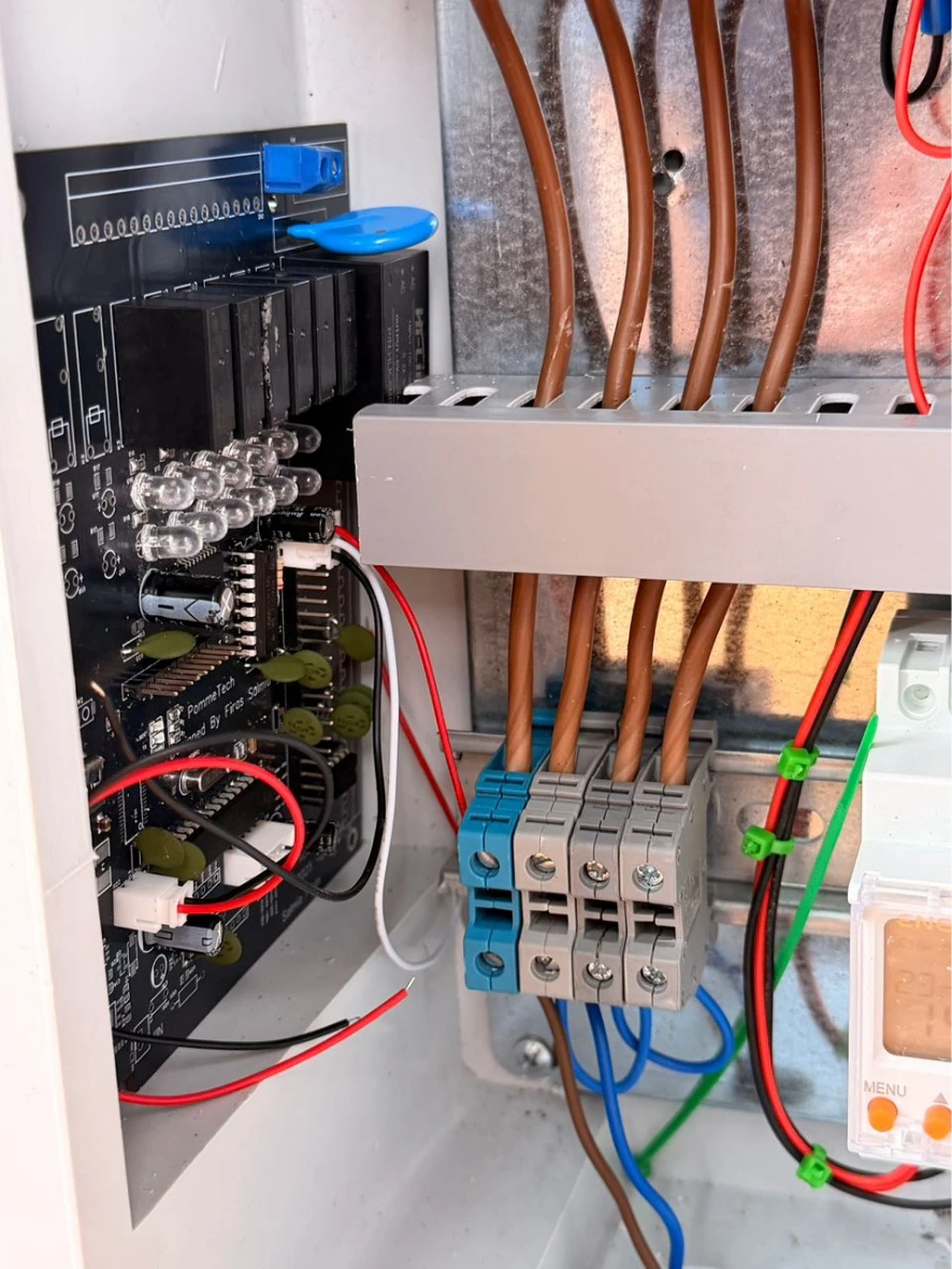 Installed control board with relays and cabinet wiring
